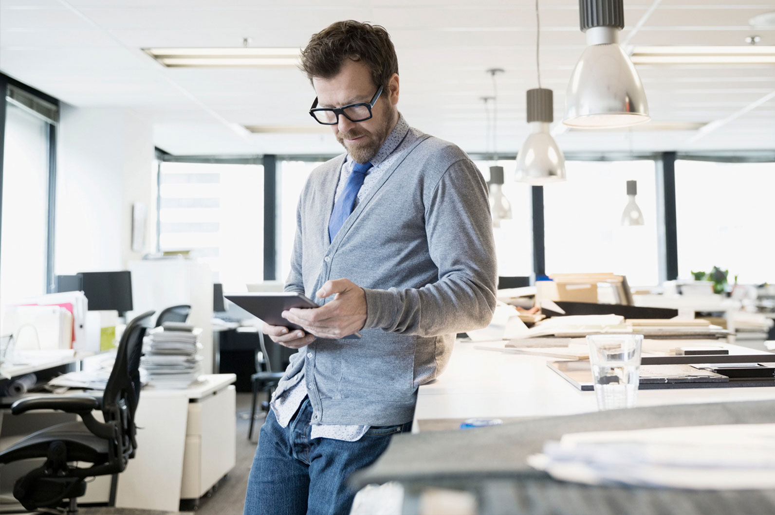 Businesswoman-text-messaging-in-conference-room
