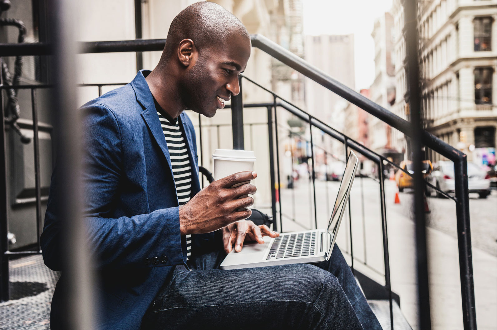 Man-on-computer-outside