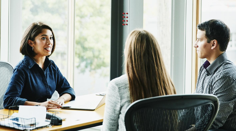 women meeting with young couple